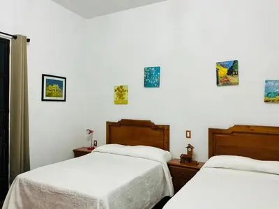 Cama o camas de una habitación en Hotel Y Villas el Encuentro