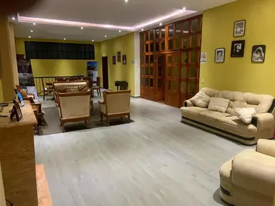 Zona de estar de Hotel Y Villas el Encuentro