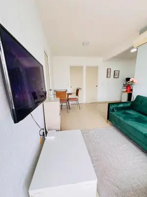 Una televisión o centro de entretenimiento en Temixco Mágico con alberca