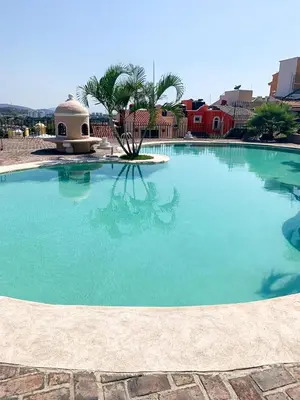 Piscina en o cerca de Encantadora Casa con Jacuzzi Privado y Alberca