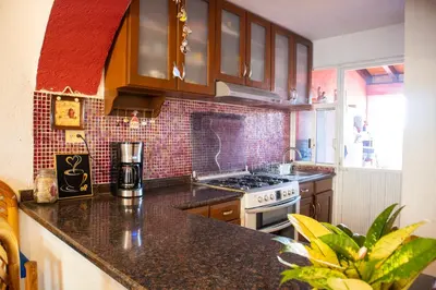 Una cocina o zona de cocina en Encantadora Casa con Jacuzzi Privado y Alberca