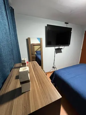 Una televisión o centro de entretenimiento en Casa residencial Santa María