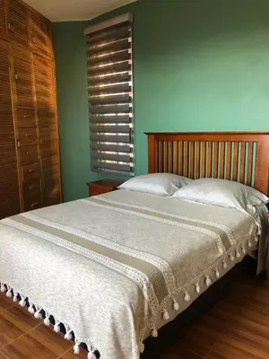 Cama o camas de una habitación en Tita Coco1