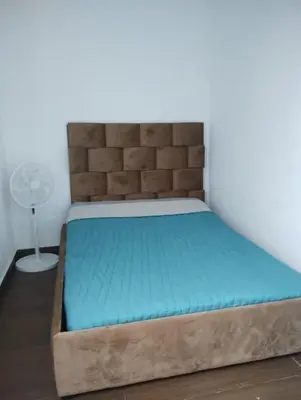 Cama o camas de una habitación en Hermosa casa vista al lago