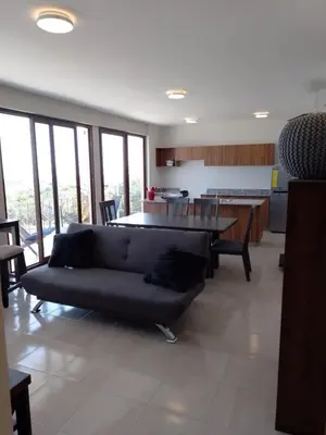 Zona de estar de Isla del amor Departamento para 7 vista al mar alberca y embarcadero