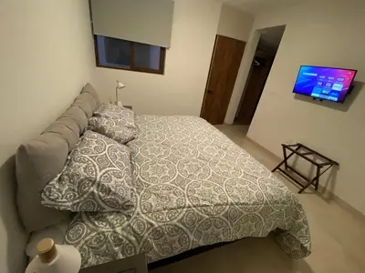 Cama o camas de una habitación en Isla del amor Departamento para 7 vista al mar alberca y embarcadero