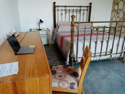 Cama o camas de una habitación en Bungalow al pie de la montaña
