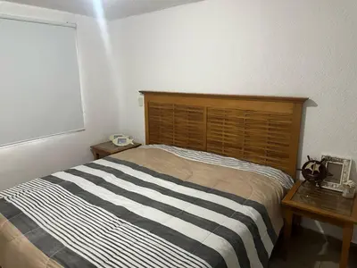 Cama o camas de una habitación en Casa en Acapulco los tulipanes