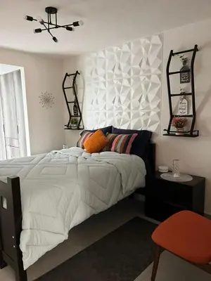 Cama o camas de una habitación en Hermosa casa alberca climatizada
