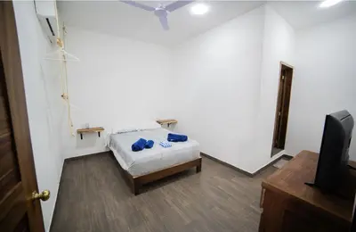 Una televisión o centro de entretenimiento en ZAPATA Casa Vista al Mar