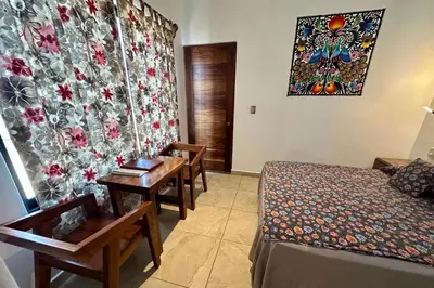 Cama o camas de una habitación en Beachfront Paradise Boutique Hotel - Breeze Room ll