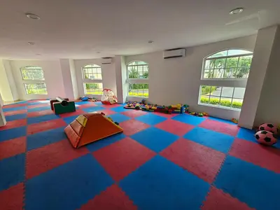 Club infantil en Diamante Lakes Condominium, in front of Arena GNP