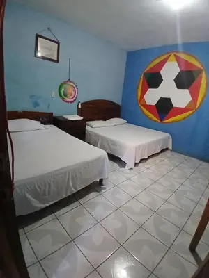 Cama o camas de una habitación en Posada Luna y Sol