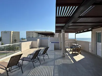 Un balcón o terraza de Punta Arena - Beach - Pool - WiFi - Jacuzzi