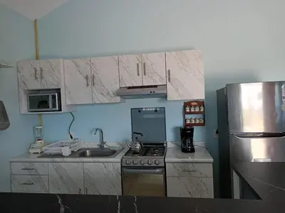 Una cocina o zona de cocina en Family Residential