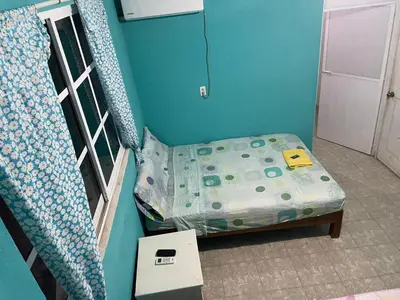 Cama o camas de una habitación en Hotel Toño