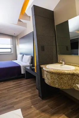 Cama o camas de una habitación en Hotel Aranjuez