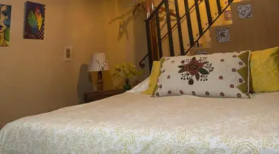 Cama o camas de una habitación en La Adornada Nardo