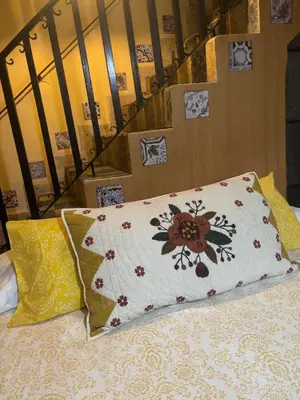 Cama o camas de una habitación en La Adornada Nardo