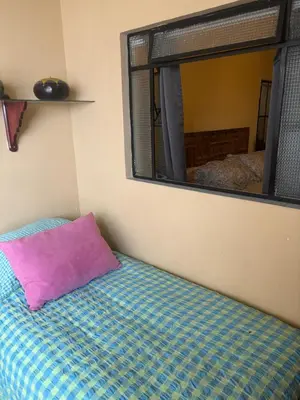 Cama o camas de una habitación en La Adornada Girasol