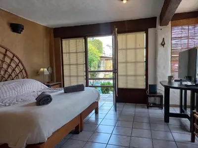 Cama o camas de una habitación en La Casa del Sol - Cuernavaca