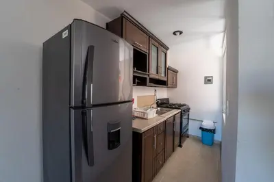 Una cocina o zona de cocina en Departamento El Dorado