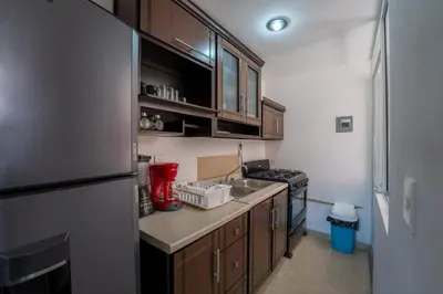 Una cocina o zona de cocina en Departamento El Dorado