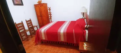 Cama o camas de una habitación en La Casita de Luca
