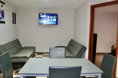 Una televisión o centro de entretenimiento en Apartment, Star Hotel