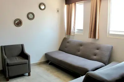 Zona de estar de Hotel Estrella Apt B