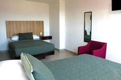 Cama o camas de una habitación en Hotel Estrella Apt B