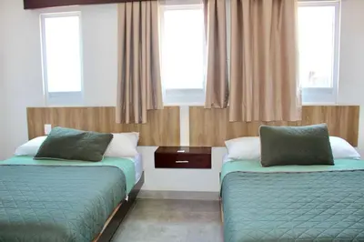Cama o camas de una habitación en Hotel Estrella Apt B