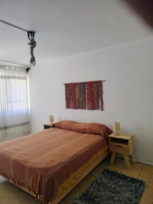 Cama o camas de una habitación en EL LIMÓN departamento