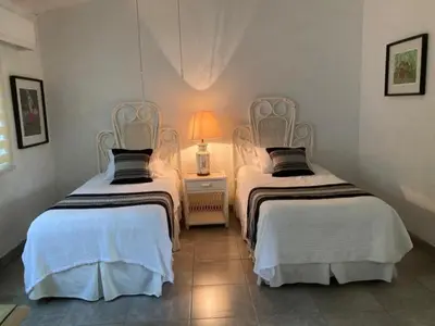 Cama o camas de una habitación en Exclusiva Propiedad Vacacional