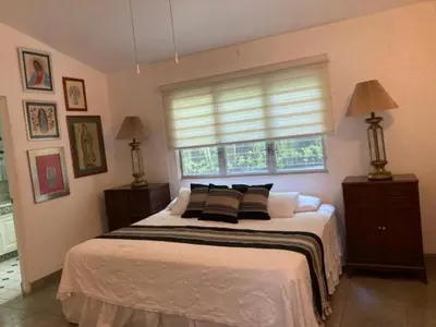 Cama o camas de una habitación en Exclusiva Propiedad Vacacional