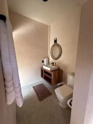 Un baño de Hotel Renata