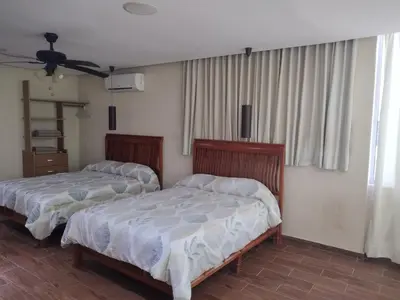 Cama o camas de una habitación en Casa Kleha Familiar y Comodidad