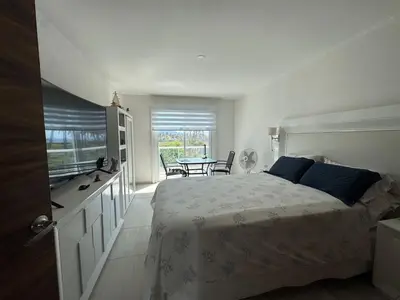 Cama o camas de una habitación en Casanar energía Sanadora frente al mar