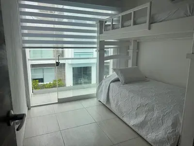 Cama o camas de una habitación en Casanar energía Sanadora frente al mar