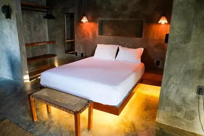 Cama o camas de una habitación en Ikal Puertecito Beach front House