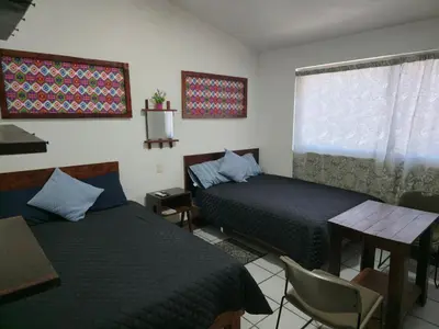 Cama o camas de una habitación en Cómoda habitación doble #5