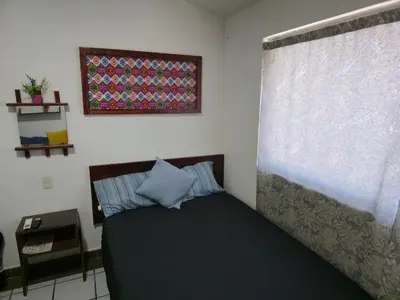 Cama o camas de una habitación en Cómoda habitación doble #5