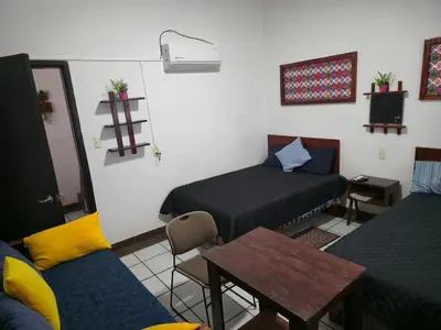 Zona de estar de Cómoda habitación doble #5