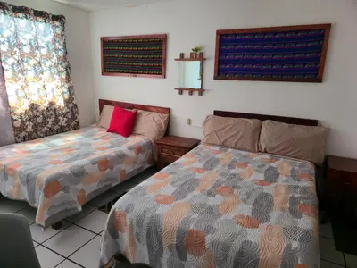 Cama o camas de una habitación en Habitación amplia climatizada LuzSerena #9