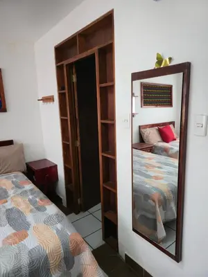 Cama o camas de una habitación en Habitación amplia climatizada LuzSerena #9