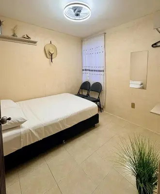 Cama o camas de una habitación en Departamento tranquilo Huatulco