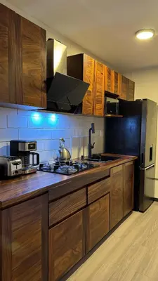Una cocina o zona de cocina en Departamento equipado a 10 minutos de la playa