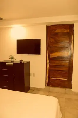 Cama o camas de una habitación en Penthouse vistamar puerto escondido