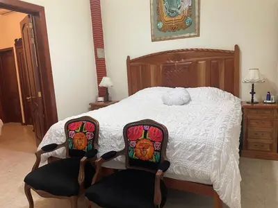 Cama o camas de una habitación en Casa del León