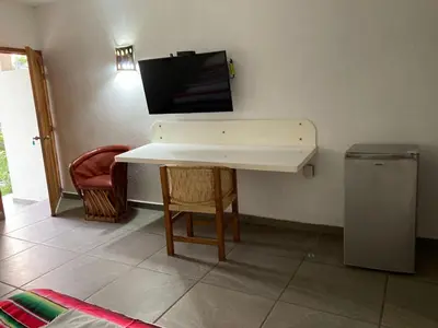 Una televisión o centro de entretenimiento en hotel las olas zicatela 2